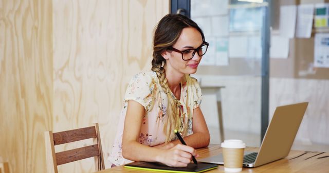 Young Professional Woman Working on Laptop in Office Setting - Download Free Stock Images Pikwizard.com