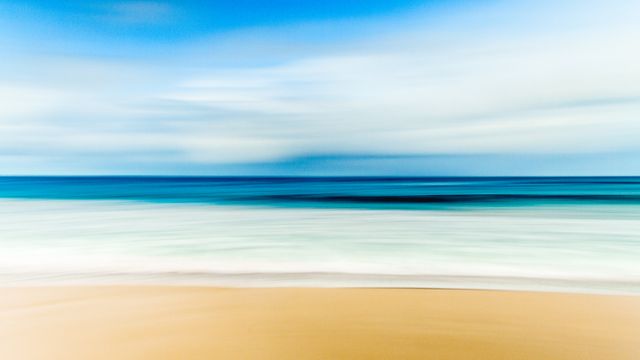 Abstract Beach Scene with Blurred Waves and Blue Sky - Download Free Stock Photos Pikwizard.com