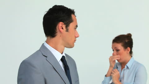 Man Wearing Mask as Woman Sneezes in Background, Awareness of Health Safety