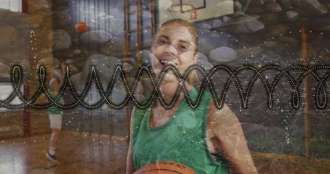 Smiling Athlete in Gym with Basketball and Artistic Waveform Overlay