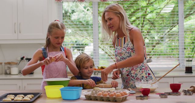 Mother and Children Baking Cookies in Bright Kitchen - Download Free Stock Images Pikwizard.com