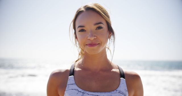 Fit Woman Smiling Outdoors by Ocean - Download Free Stock Images Pikwizard.com