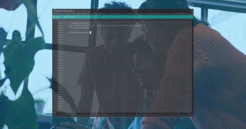 Debugging team collaborating over laptop with terminal overlay in open-plan office
