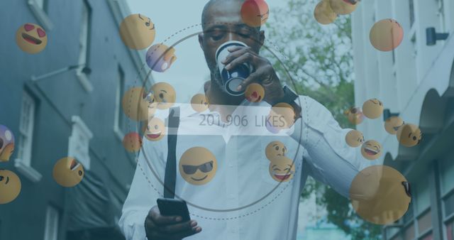 Thumbs up icon with increasing likes and face emojis against african american man drinking coffee - Download Free Stock Photos Pikwizard.com
