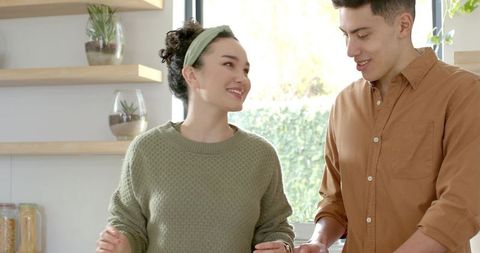 Culinary Couple Cooking Together in Modern Kitchen