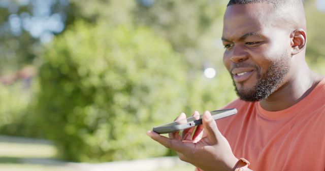 Young Man Talking on Smartphone in Outdoor Park - Download Free Stock Images Pikwizard.com