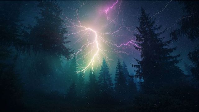 Dramatic Lightning Bolt Over Pine Forest at Night