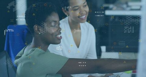 Coworkers in Modern Office Collaborating on Data Analysis