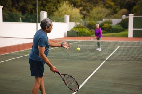 Senior Couples Enjoying Tennis for Active Lifestyle and Togetherness