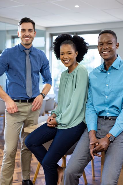 Diverse Colleagues Smiling in Modern Office - Download Free Stock Images Pikwizard.com