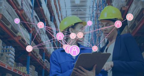 Women Warehouse Team Collaborating with Digital Network Overlay for Logistics Management