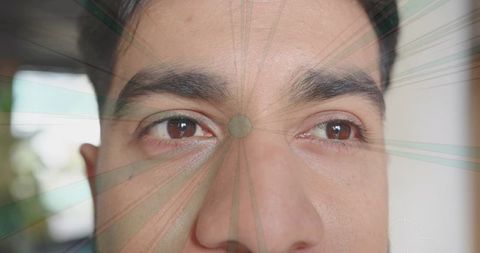 Focused Male Eyes with Technology Overlay Symbolizing Insight