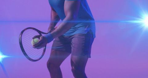 Athlete preparing tennis serve in neon purple lighting with lens flares and dramatic pose