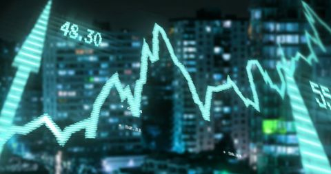 Digital Financial Charts Overlay on Night Cityscape