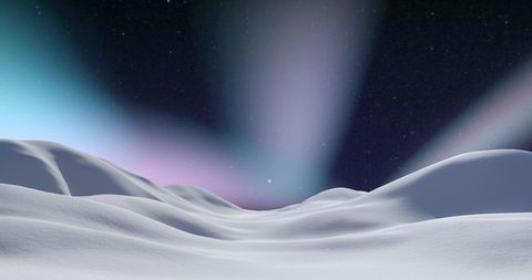 Snow-Covered Landscape Beneath Stunning Northern Lights