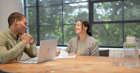 Businesswoman signing employment contract in professional modern office