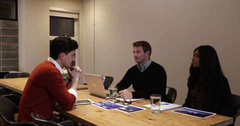 Business Meeting in Modern Office Setting with Young Professionals