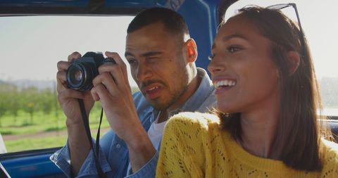 Happy Couple on Scenic Road Trip Capturing Memories - Download Free Stock Images Pikwizard.com