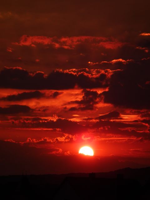 Dramatic Red Sunset with Cloudy Sky - Download Free Stock Photos Pikwizard.com