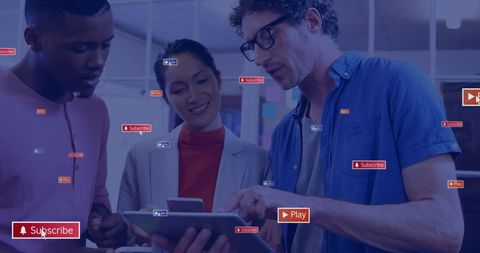Diverse Team Engaging with Digital Tablet and Social Media Icons