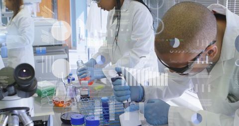 Diverse Scientists in Laboratory Analyzing Digital Data Interface - Download Free Stock Images Pikwizard.com