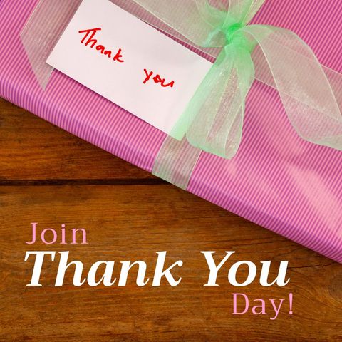 Thank You Day Pink Wrapped Gift on Wooden Table