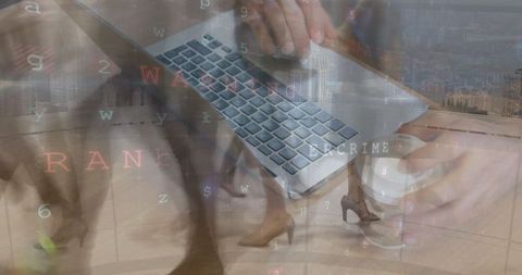 Business Hands Typing on Laptop with Overlay of Timelapse Footage