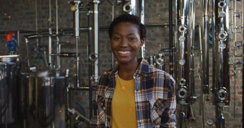 Energetic Female Brewer in Modern Craft Brewery Environment