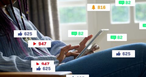 Woman engaging online amidst social media alerts at home