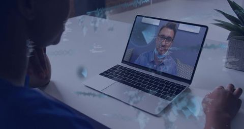 Telemedicine Consultation on Laptop Nurse Watching Virtual Doctor Wearing Mask Lowered