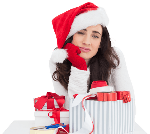 Unsure Brunette in Santa Hat Packing Transparent Holiday Gifts