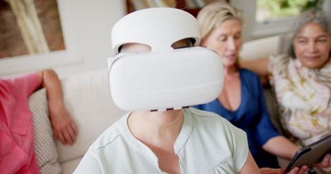 Group of Women Socializing with Virtual Reality Technology Experience