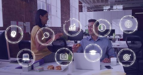 Business technology icons overlaying office lunch scene