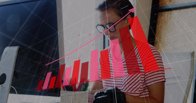 Woman Analyzing Data with Financial Graph Overlay at Office Desk - Download Free Stock Images Pikwizard.com