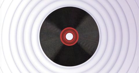 Spinning vinyl record on concentric ripple backdrop, minimal modern music technology design