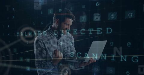 Man Celebrating Malware Detection and System Scanning Success - Download Free Stock Images Pikwizard.com