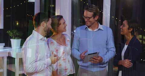 Diverse Business Team Discussing Financial Strategy in Modern Office