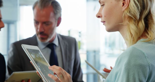 Business Team Using Digital Tablets in Office Meeting - Download Free Stock Images Pikwizard.com