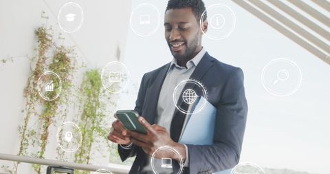African American Businessman Interacting with Digital Interfaces