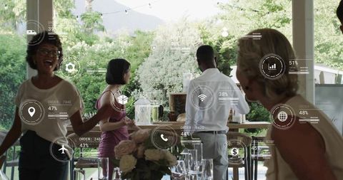 Multicultural adults socializing on garden terrace with augmented reality data overlays
