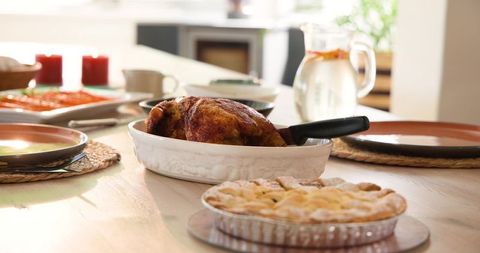 Homemade Feast with Roasted Chicken and Freshly Baked Pie
