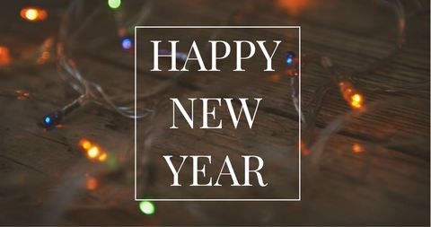 Happy New Year Message with Festive Colorful Fairy Lights - Download Free Stock Images Pikwizard.com