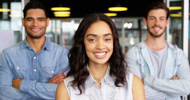 Confident Young Team Smiling at Modern Office - Download Free Stock Images Pikwizard.com