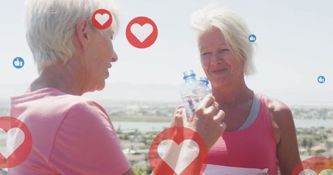 Senior women enjoying fitness activity with social media elements