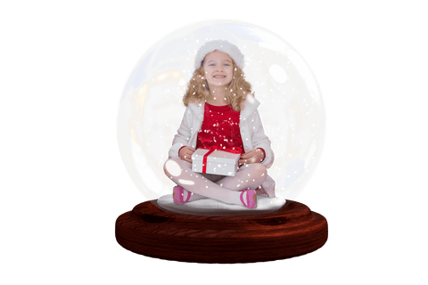 happy caucasian girl in christmas snow globe holding gift - Download Free Stock Videos Pikwizard.com