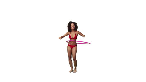Joyful Woman in Bikini Using Hula Hoop Bright White Background