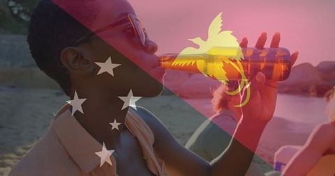 Sunglasses and Beach Beverage with Flag Overlay