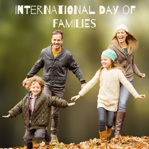 Happy family outdoors celebrating international day of families