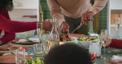 Family Celebrating Warm Gathering with Feast