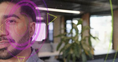 AR Analyst Engaging with Futuristic Interface in Modern Office